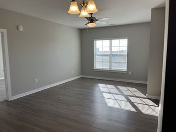 A room with a ceiling fan and a window with blinds at James Lewis JR, 29403